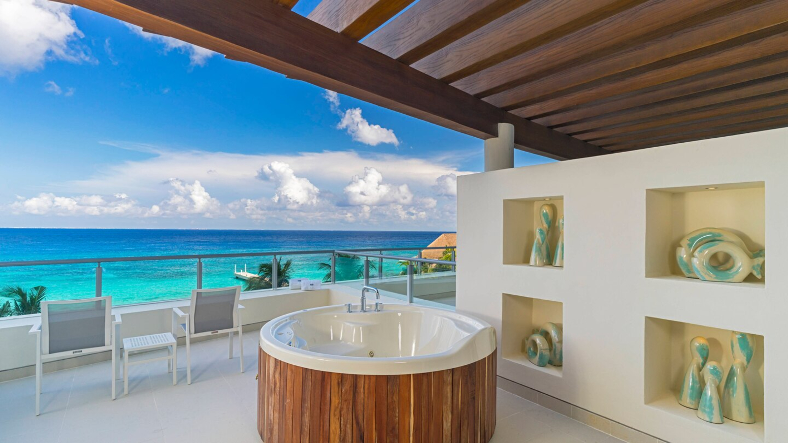 Outdoor Whirpool on balcony overlooking the ocean.