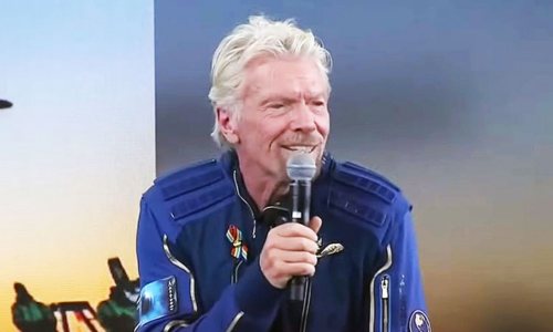 Making Gay Travel History, Richard Branson Flies Gay Flag Onboard VSS Unity