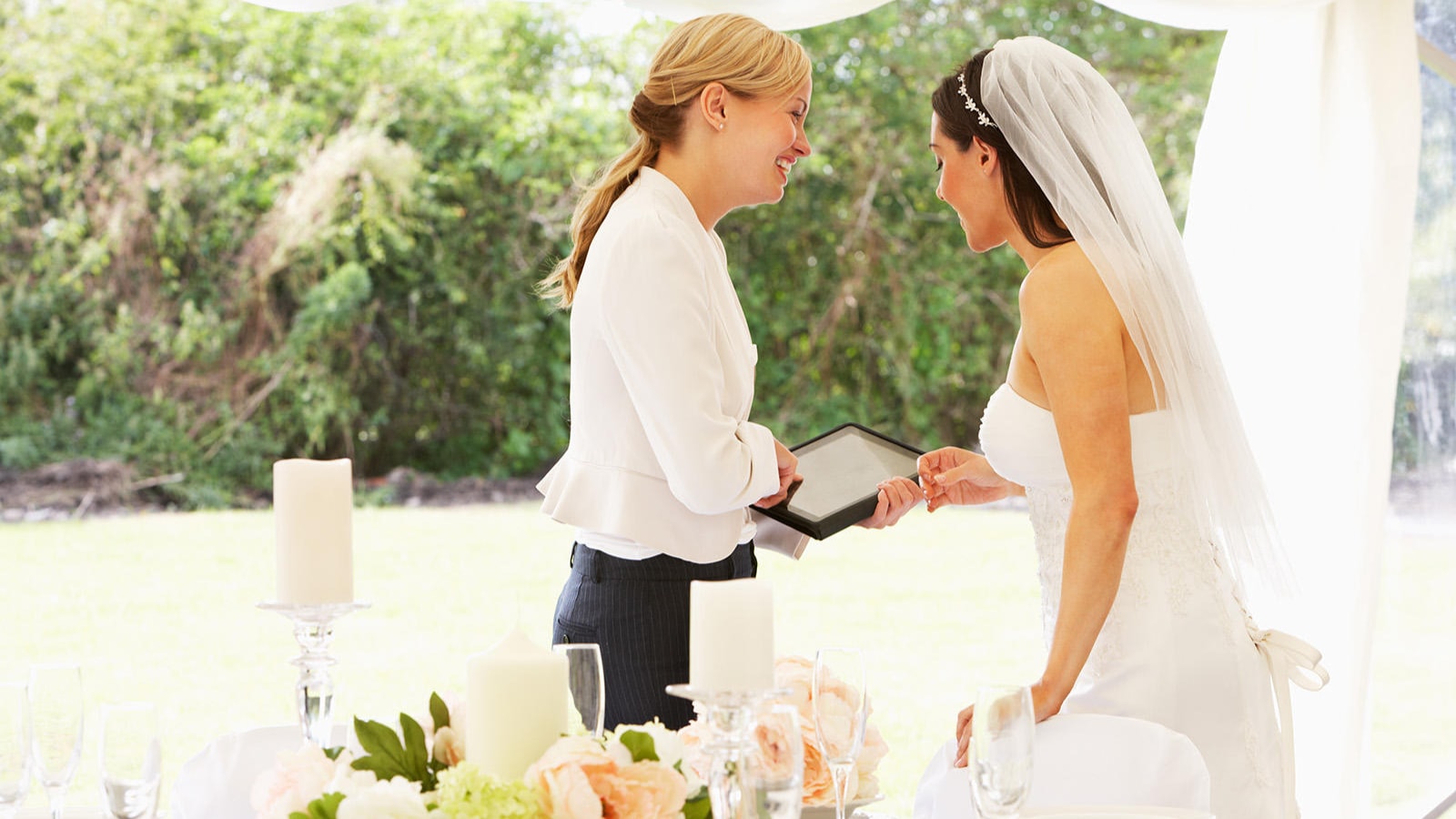 Bride talking to a hotel staff